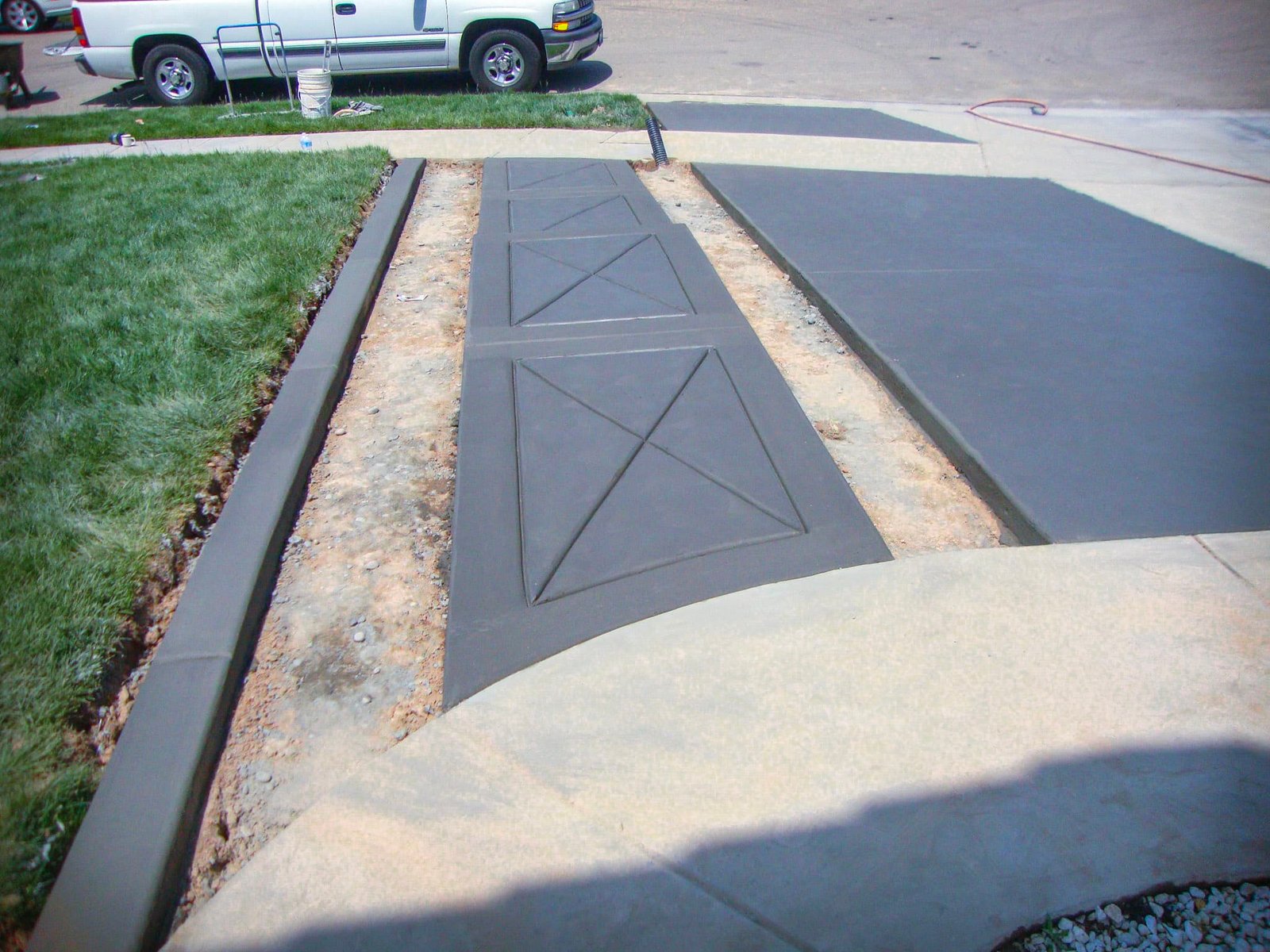 Concrete driveway with matching walkway